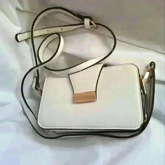 Handbags - White Shoulder Bag with orange and blue pouches.